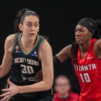 Jun 11, 2026; College Park, Georgia, USA; New York Liberty forward Breanna Stewart (30) is guarded by Atlanta Dream guard Rhyne Howard (10) during the first half at Gateway Center Arena at College Park. Mandatory Credit: Dale Zanine-Imagn Images