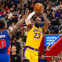 Mar 23, 2026; Detroit, Michigan, USA; Los Angeles Lakers LeBron James (23) shoots a jump shot over Detroit Pistons Jalen Duren (0) during the first quarter at Little Caesars Arena. Mandatory Credit: David Reginek-Imagn Images