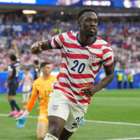LOS ANGELES, CALIFORNIA - JUNE 12: Folarin Balogun #20 of United States celebrates scoring during the first half against Paraguay during the FIFA World Cup 2026 Group D match between USA and Paraguay at Los Angeles Stadium on June 12, 2026 in Los Angeles, California. (Photo by Dave Bernal/ISI Photos/ISI Photos via Getty Images)