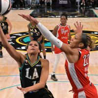 Jun 2, 2026; Los Angeles, California, USA; Los Angeles Sparks forward Cameron Brink (22) drives past Las Vegas Aces center A'ja Wilson (22) during the second half at Crypto.com Arena. Mandatory Credit: Jayne Kamin-Oncea-Imagn Images