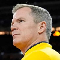 Michigan head coach Dusty May looks on from the court ahead of the NCAA national championship game against Connecticut at Lucas Oil Stadium in Indianapolis on Monday, April 6, 2026.