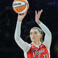 LAS VEGAS, NEVADA - JULY 11: Justine Pissott #13 of the Las Vegas Aces shoots a 3-pointer against Valeriane Ayayi #11 of the Phoenix Mercury in the fourth quarter of their game at Michelob ULTRA Arena on July 11, 2026 in Las Vegas, Nevada. The Aces defeated the Mercury 106-58. NOTE TO USER: User expressly acknowledges and agrees that, by downloading and or using this photograph, User is consenting to the terms and conditions of the Getty Images License Agreement. (Photo by Ethan Miller/Getty Images)