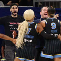 CHICAGO, ILLINOIS - AUGUST 23: Former basketball player Enes Kanter Freedom and Natasha Cloud #9 of the Chicago Sky yell at one another during the second half between the Chicago Sky and the Indiana Fever at Wintrust Arena on August 23, 2026 in Chicago, Illinois.