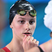 Canada's Summer McIntosh (L) and USA's Katie Ledecky react after a heat for the women's 400m freestyle event during the Budapest 2022 World Aquatics Championships at Duna Arena in Budapest on June 18, 2022. (Photo by Oli SCARFF / AFP) (Photo by OLI SCARFF/AFP via Getty Images)