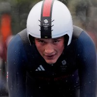 Jul 27, 2024; Paris, France; Josh Tarling (GBR) in the men’s individual time trial road cycling during the Paris 2024 Olympic Summer Games at Grand Palais-Pont Alexandre III. Mandatory Credit: Andrew P. Scott-USA TODAY Sports