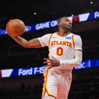 Mar 1, 2026; Atlanta, Georgia, USA; Atlanta Hawks forward Jonathan Kuminga (0) dunks against the Portland Trail Blazers in the fourth quarter at State Farm Arena. Mandatory Credit: Brett Davis-Imagn Images