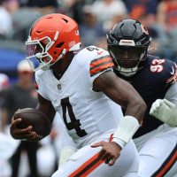 Aug 15, 2026; Chicago, Illinois, USA; Cleveland Browns quarterback Deshaun Watson (4) rushes the ball past Chicago Bears defensive tackle Kentavius Street (93) during the first half at Soldier Field. Mandatory Credit: Mike Dinovo-Imagn Images