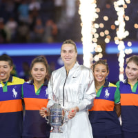 Sep 6, 2025; Flushing, NY, USA; Aryna Sabalenka poses for a photo with the ball kids and the championship trophy after winning the women's singles final against Amanda Anisimova (USA) (not pictured) of the 2025 US Open tennis championships at Billie Jean King National Tennis Center. Mandatory Credit: Mike Frey-Imagn Images