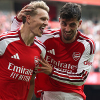 CARDIFF, WALES - AUGUST 16: Martin Odegaard of Arsenal celebrates their third goal with Kai Havertz of Arsenal during the 2026 FA Community Shield match between Arsenal and Manchester City at Principality Stadium on August 16, 2026 in Cardiff, Wales. (Photo by Charlotte Wilson/Offside/Offside via Getty Images)