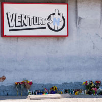 A memorial sits outside Venture-N Bar.