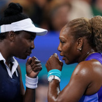 Aug 17, 2026; Mason, OH, USA; Serena Williams and Venus Williams of the United States talk after a point against Marta Kostyuk of Ukraine and Peyton Stearns of the United States in their doubles match during the Cincinnati Open at Lindner Family Tennis Center. Mandatory Credit: Aaron Doster-Imagn Images