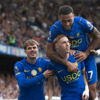 LONDON, ENGLAND - AUGUST 30: Cole Palmer celebrates scoring Chelsea's fourth goal with Pep Chavarría, Morgan Rogers and Jorrel Hato during the Premier League 2026/27 match between Chelsea FC and Brighton & Hove Albion at Stamford Bridge on August 30, 2026 in London, United Kingdom. (Photo by Visionhaus/Getty Images)
