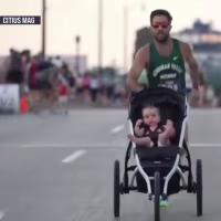 Good News: Dad breaks World Record for mile run while pushing stroller