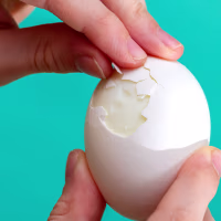 Peel hard boiled egg