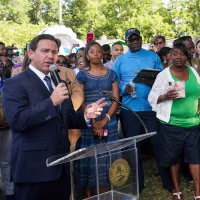 Florida Gov. Ron DeSantis speaks at a prayer vigil for the victims of a mass shooting a day earlier, in Jacksonville, Fla., on Aug. 27, 2023.