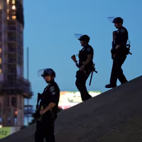Austin police keep watch as demonstrators gather in downtown Austin, Texas, to protest the death of George Floyd on June 4, 2020.