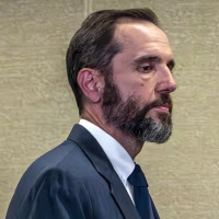 Special counsel Jack Smith;  Former President Donald Trump.