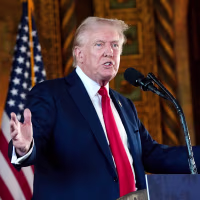 Donald Trump speaks to reporters