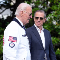 President Joe Biden walks with his son Hunter Biden at the White House on July 26, 2024.
