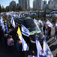 Image: Funeral Held For Former Israeli Hostage Members Of The Bibas Family