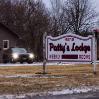 A New York State Trooper vehicle is parked at Patty’s Lodge in Hopewell, N.Y