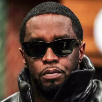 Sean Combs wearing sunglasses