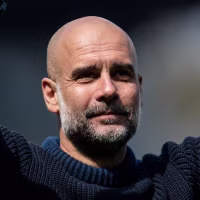 Pep Guardiola of Manchester City is saluting their fans after the Premier League match between Fulham and Manchester City at Craven Cottage in London, on May 11, 2024. (Photo by Federico Maranesi/MI News/NurPhoto via Getty Images)