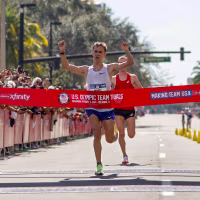 Conner Mantz crosses the finish line to place first during the 2024 U.S. Olympic Team Trials