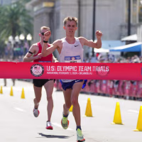 Feb 3, 2024; Orlando, FL, USA; Conner Mantz (right) and Clayton Young place first and second in 2:09:05 and 2:09:06 during the US Olympic Marathon Team Trials. Mandatory Credit: Kirby Lee-USA TODAY Sports