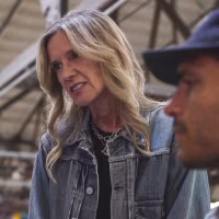 CEO Michelle Gass talks to a team member about the use of AI at Levi's.