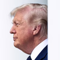 Donald Trump as seen from the side, standing in between white columns