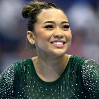 HARTFORD, CONNECTICUT - MAY 18: Sunisa Lee smiles prior to competing in the 2024 Core Hydration Classic at XL Center on May 18, 2024 in Hartford, Connecticut. (Photo by Tim Nwachukwu/Getty Images)