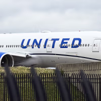 A United Airlines Plane Taxi On The Runway At O'Hare International Airport In Chicago, Illinois