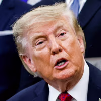 Donald Trump sits at his desk in the Oval Office, holding a chart in one hand titled "President Donald J. Trump
Pharmaceutical Investment Commitments
Today: $19.6 Billion
Total: $638 Billion