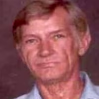 Image: A photo of James Chafin wearing a blue shirt