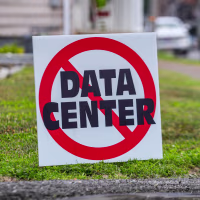 A yard sign expressing opposition to allowing data center construction.
