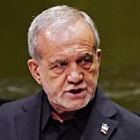 Masoud Pezeshkian speaks at the podium inside the United Nations.