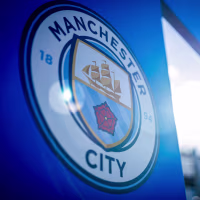 The Manchester logo.