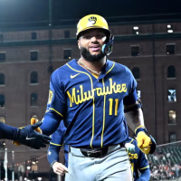 BALTIMORE, MARYLAND - SEPTEMBER 18: Jackson Chourio #11 of the Milwaukee Brewers celebrates with Brice Turang #2 after hitting a three-run home run in the second inning against the Baltimore Orioles at Oriole Park at Camden Yards on September 18, 2026 in Baltimore, Maryland. (Photo by Greg Fiume/Getty Images)