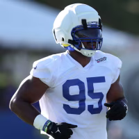 LOS ANGELES, CALIFORNIA - JULY 27: Myles Garrett #95 of the Los Angeles Rams jogs off the field during the Los Angeles Rams Training Camp at Loyola Marymount University on July 27, 2026 in Los Angeles, California. (Photo by Katelyn Mulcahy/Getty Images)