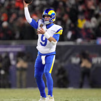 CHICAGO, ILLINOIS - JANUARY 18: Matthew Stafford #9 of the Los Angeles Rams passes the ball against Kyler Gordon #6 of the Chicago Bears during the fourth quarter in the NFC Divisional Playoffs at Soldier Field on January 18, 2026 in Chicago, Illinois.  (Photo by Patrick McDermott/Getty Images)