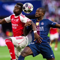 BUDAPEST, HUNGARY - MAY 30: Bukayo Saka of Arsenal in duel against Nuno Mendes of Paris Saint Germain during the UEFA Champions League Final 2026 match between Paris Saint-Germain and Arsenal FC at Puskas Arena on May 30, 2026 in Budapest, Hungary. (Photo by Vitalii Kliuiev/Getty Images)