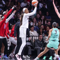 Sep 21, 2026; Brooklyn, New York, USA;  Atlanta Dream forward DeWanna Bonner (24) takes a three-point shot past New York Liberty forward Breanna Stewart (30) in the third quarter at Barclays Center. Mandatory Credit: Wendell Cruz-Imagn Images