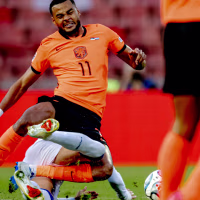 Netherlands forward Cody Gakpo and Serbia midfielder Sasa Lukic during the UEFA Nations League match between Serbia and the Netherlands at Rajko Mitic Stadion in Belgrade, on September 27, 2026. (Photo by Stefan Koops/EYE4IMAGES/NurPhoto via Getty Images)