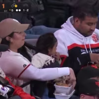 She went viral for carrying her baby and food while husband sat by. Now she's telling her story.