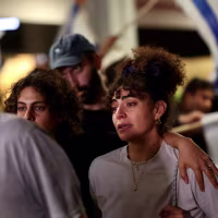 Israel's main television channels broadcast their arrival at Ben Gurion Airport live, where they were met by paramedics and social workers. 