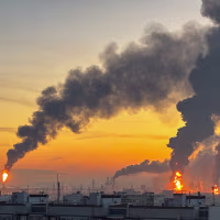 Image: Plumes of smoke rise from fires at an oil refinery following what the authorities say is a Ukrainian drone strike in the course of the Russia-Ukraine conflict, in Moscow