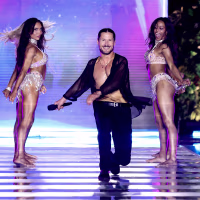 Val Chmerkovskiy dancing on stage.