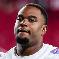 Jordan Elliott walks on the football field