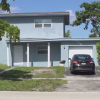 The home in Lauderhill, Fla., where Dennis West was found dead.